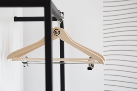 Premium bedding, desk, laptop workspace, blackout drapes