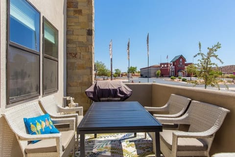 front patio with dining areas and 2 bbq's