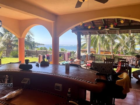 View from kitchen. Surf break in distance.