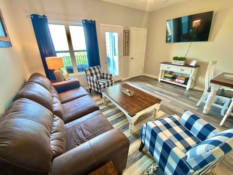 Open living area with Smart TV & games leads to deck with SPECTACULAR Ozark view