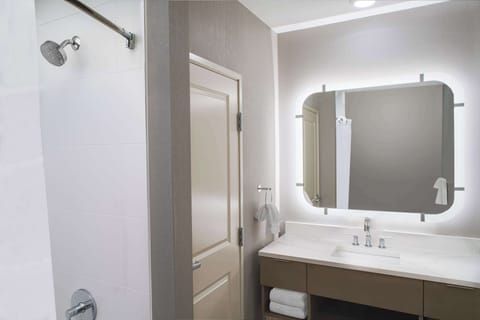 Suite, 1 Bedroom | Bathroom | Combined shower/tub, hair dryer, towels