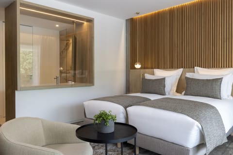 Premium bedding, pillowtop beds, in-room safe, desk