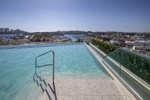 Indoor pool, seasonal outdoor pool, pool umbrellas