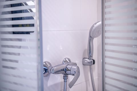 Shower, rainfall showerhead, eco-friendly toiletries, hair dryer