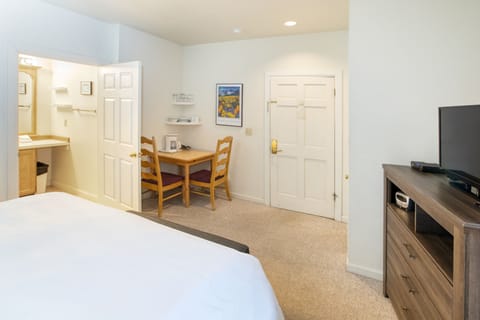 The studio comes with an ensuite, a small seating area and a mini fridge and microwave.