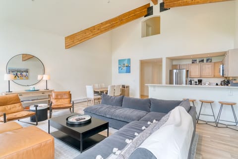 Living room features a large sectional sofa.