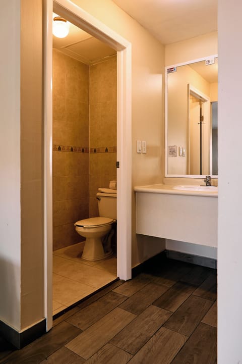 Standard Double Room, 2 Queen Beds | Bathroom | Shower, hair dryer, towels, soap