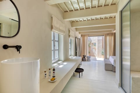 Cretan Living Suite | Bathroom | Shower, rainfall showerhead, designer toiletries, hair dryer