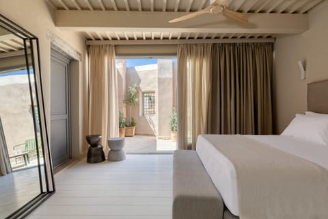 Cretan Living Suite | Premium bedding, memory foam beds, free minibar items, in-room safe