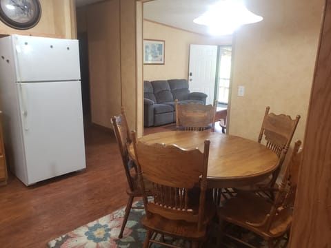 Dining area looking into living room