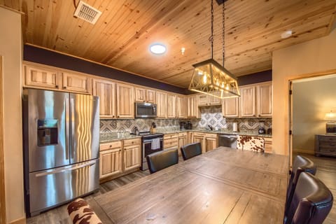 Fully Equipped Kitchen with stainless Steel appliances.