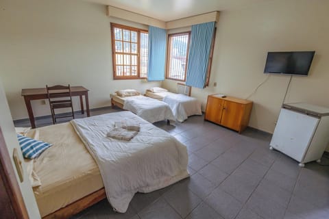 Deluxe Quadruple Room | Desk, laptop workspace, free WiFi, bed sheets