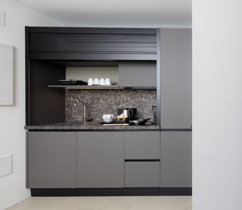 Elite Apartment | Private kitchen | Full-size fridge, microwave, espresso maker, electric kettle