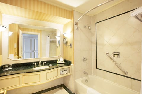 Premium Room (Level King) | Bathroom | Combined shower/tub, eco-friendly toiletries, hair dryer, bathrobes