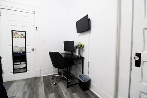 An office space in the middle bedroom.