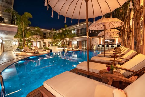 Outdoor pool, pool umbrellas, sun loungers