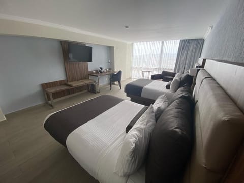 Executive Room, 2 Double Beds, City View | In-room safe, desk, blackout drapes, free WiFi