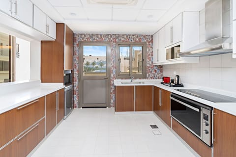 Villa | Private kitchen | Fridge, microwave, stovetop, dishwasher