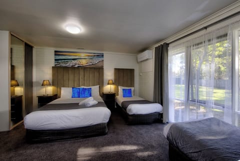 Large Family Suite (Queen and 2 Singles) | Iron/ironing board, free WiFi, bed sheets