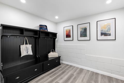 Mudroom for ski equipment, luggage, or extra supplies.