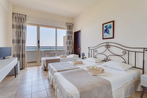 Family Room, Sea View | In-room safe, desk, laptop workspace, soundproofing