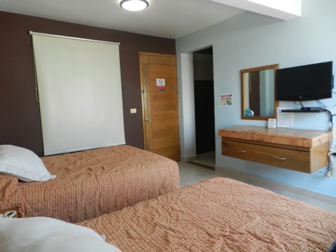 Deluxe Double Room | Blackout drapes, iron/ironing board, free WiFi, bed sheets