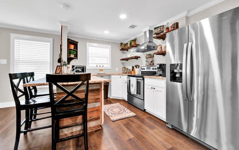 Kitchen Island Bar with 3 additional seats for dining or just hanging out.