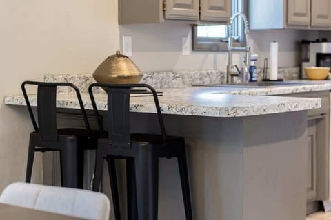 Keep the chef company at the breakfast bar and share conversation while meals sizzle