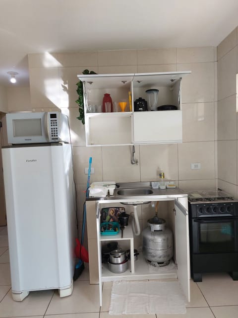 Apartment | Private kitchen | Fridge, microwave, cookware/dishes/utensils