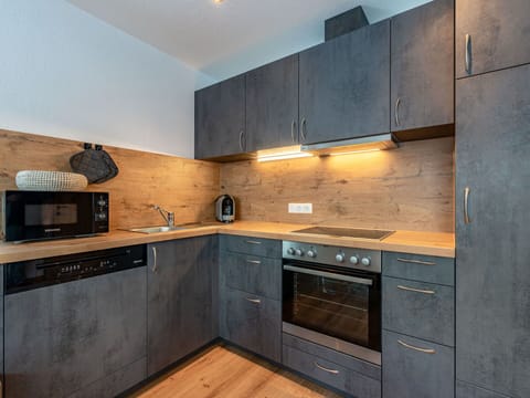 Brown, Countertop, Cabinetry, Building, Furniture, Kitchen Stove, Kitchen, Kitchen Appliance, Wood, Home Appliance