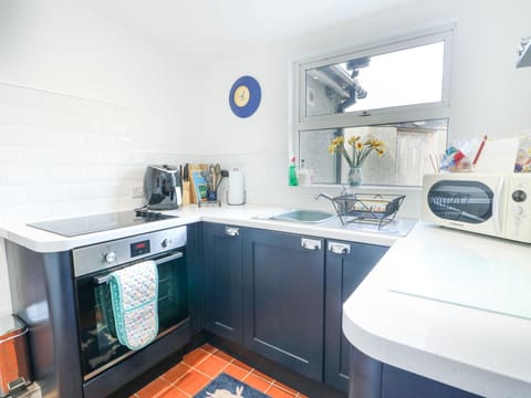 Fridge, electric kettle, toaster, cookware/dishes/utensils