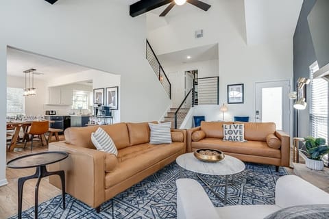 Another view of large living room. Check out the industrial black rails.