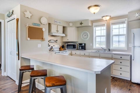 Extra seating at the counter to watch the cook.