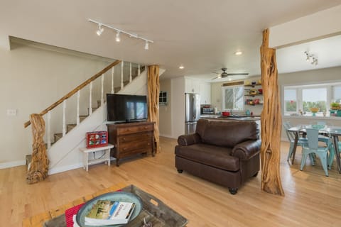 Living room, large chair and queen sleeper sofa.