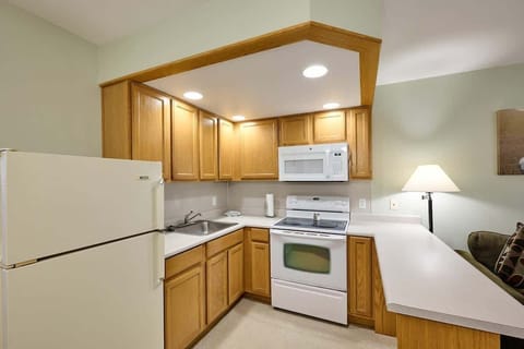 The kitchen comes fully stocked with essentials