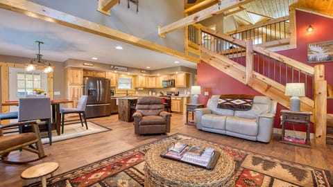 Ample and comfortable furniture adorns this log cabin