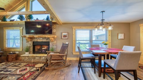 The gas fireplace has a remote control and is cozy on cool days/nights