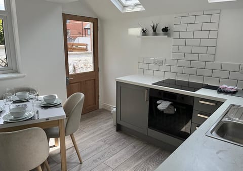 Kitchen with M&S Plates ,cups etc 