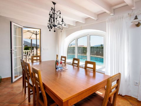 Furniture, Building, Table, Plant, Chair, Houseplant, Shade, Orange, Interior Design, Flooring