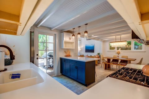 Experience the seamless flow of open-concept living, where the kitchen effortlessly transitions into the dining room.