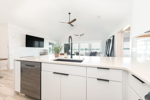 View from the kitchen island. Flatware, glasses, and cookware provided.