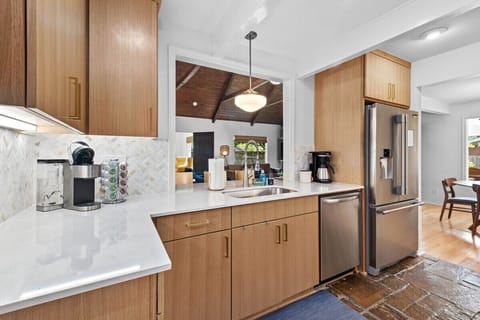 Our kitchen is complete with gorgeous natural stone floors, tons of built-in storage and state-of-the-art amenities.