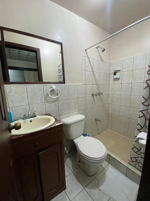 Family Quadruple Room | Bathroom | Shower, towels, soap, shampoo