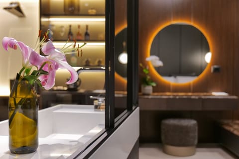 Suite, Private Pool | Bathroom | Hair dryer, slippers, towels
