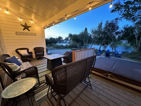 After a busy day exploring, cozy up on the back porch to enjoy the rippling water and a chorus of frogs.