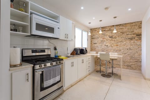 Premium Apartment | Private kitchen | Fridge, microwave, oven, espresso maker