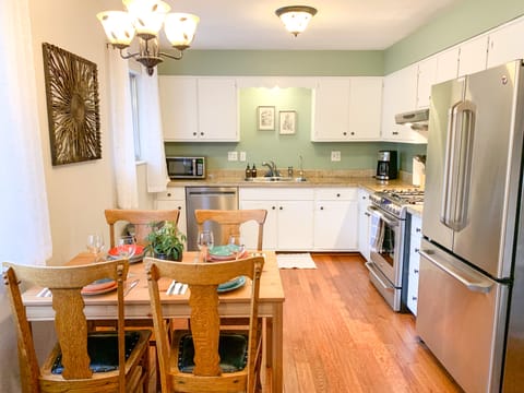 Fully stocked kitchen w/ upgraded appliances and everything needed for cooking.