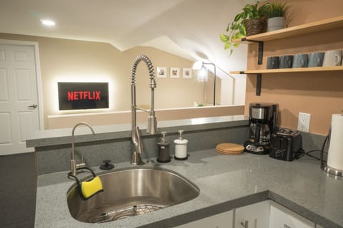 Open Kitchenette with direct TV view. Perfect for cooking & watching TV.