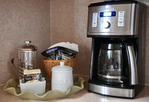 Coffee, tea, sugar, drip machine and french press available.