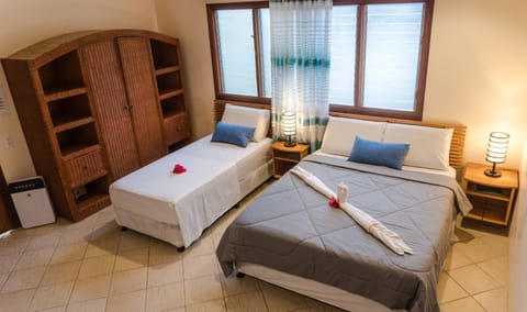 Bungalow, Multiple Beds, Pool View | Minibar, in-room safe, blackout drapes, free WiFi